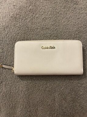 Calvin Klein Cream Zip-Around Wallet with Gold Logo